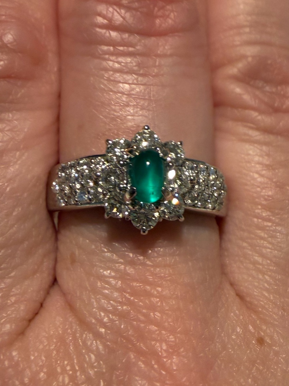 Natural emerald and diamond platinum ring